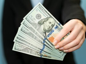 front-view-person-holding-money_23-2148547905.jpg
